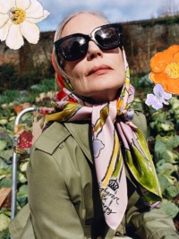 Burberry Highgrove Campaign featuring a model wearing highgrove women silk scarf