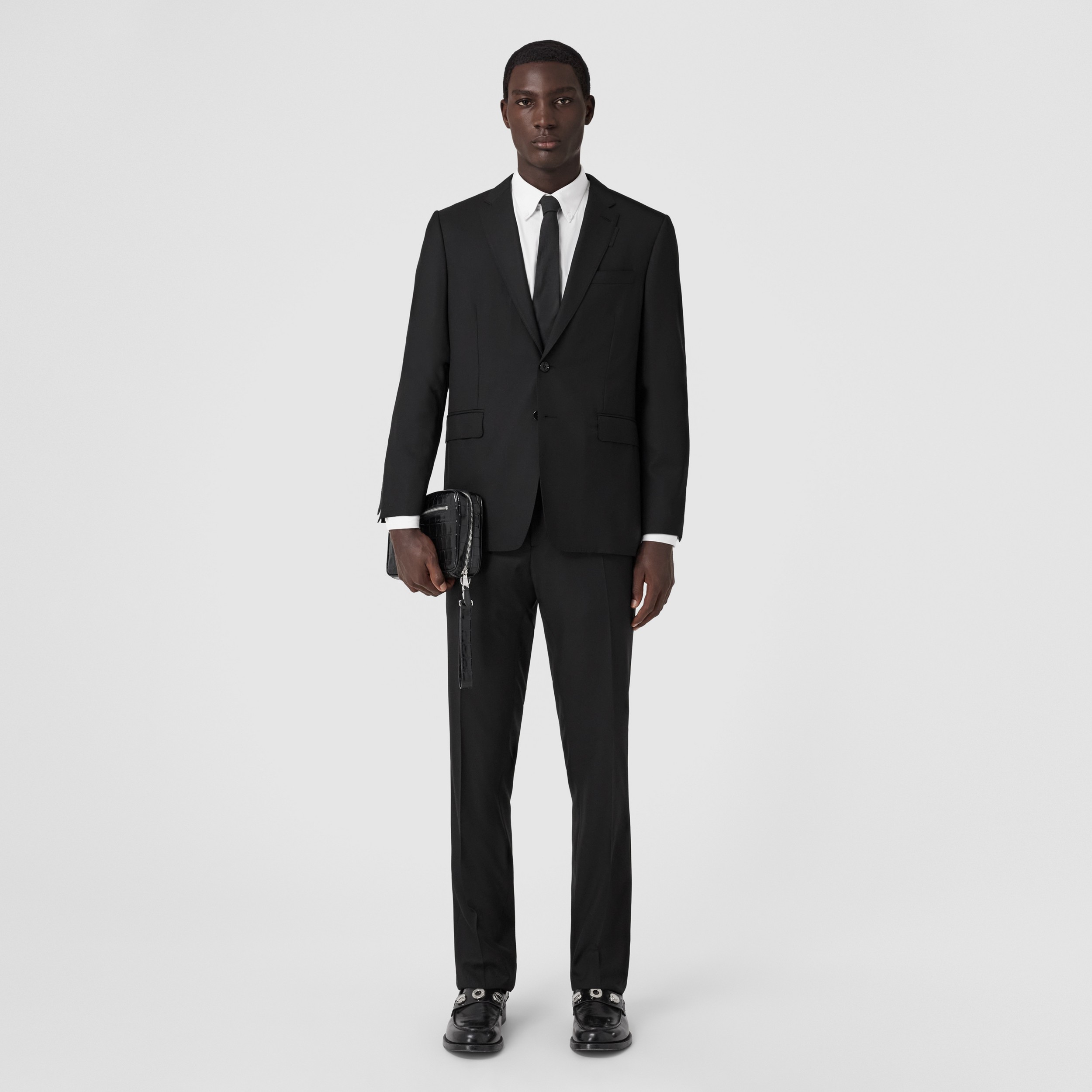 Slim Fit Wool Tailored Trousers in Black - Men | Burberry® Official - 1