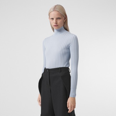 pale blue turtleneck