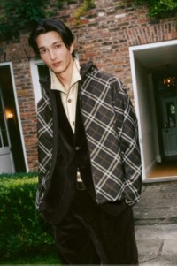 Shot of model wearing Black Velvet Suit with Check Jacket