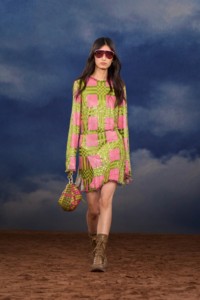 Burberry SS26 Show model Xinyue Guo wearing a Check chainmail top and kilt