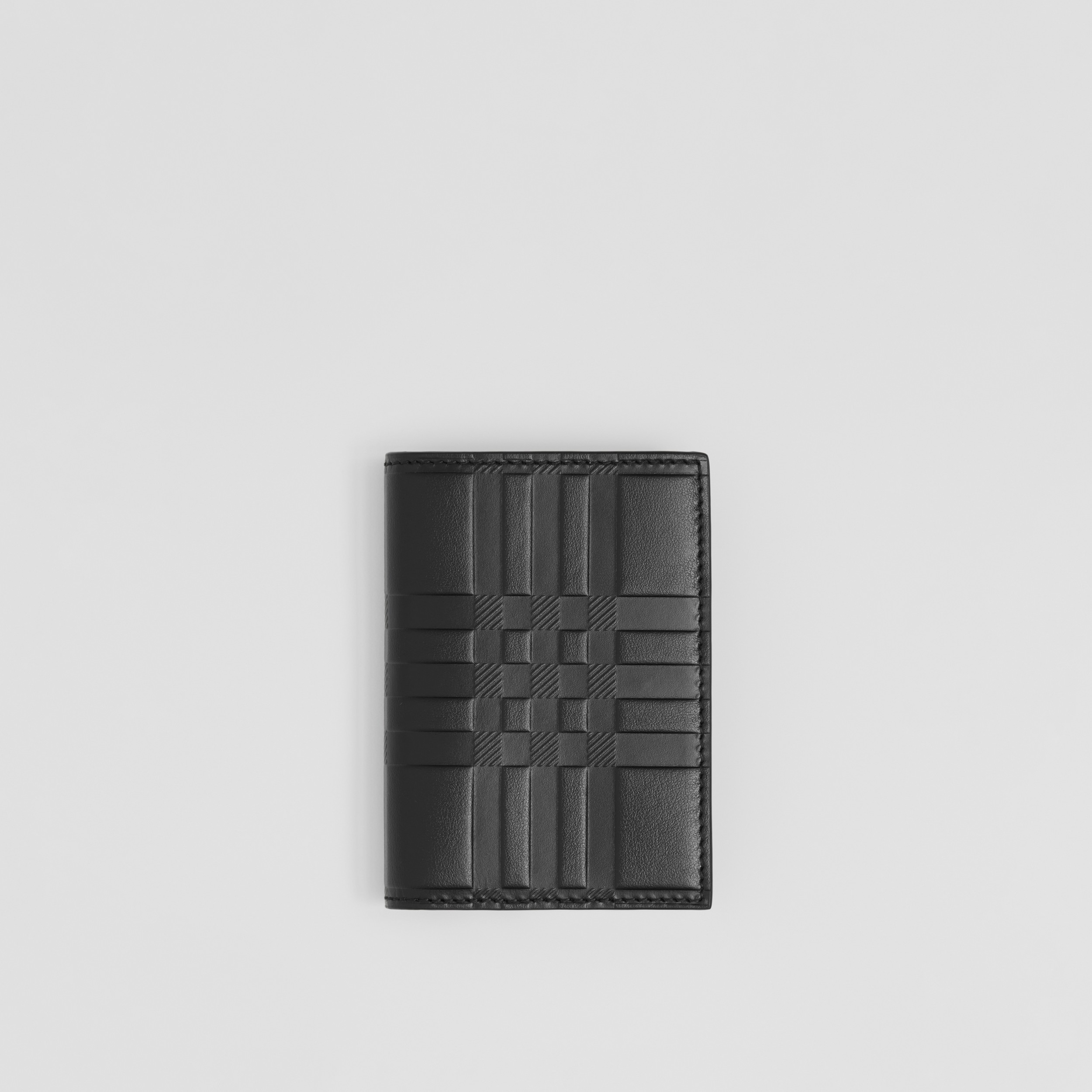 Embossed Check Leather Folding Card Case in Black - Men | Burberry® Official - 1