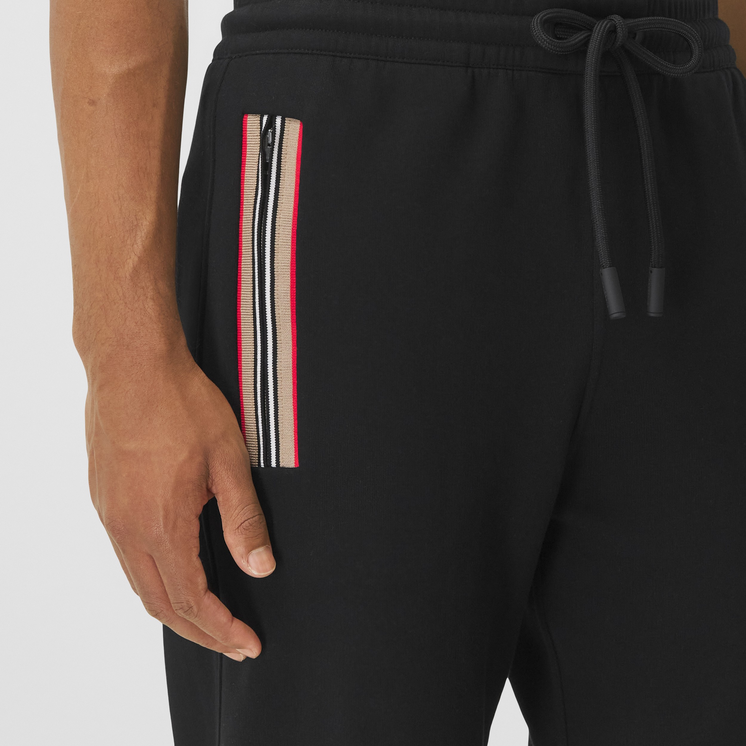 Icon Stripe Detail Cotton Jogging Pants in Black - Men | Burberry® Official