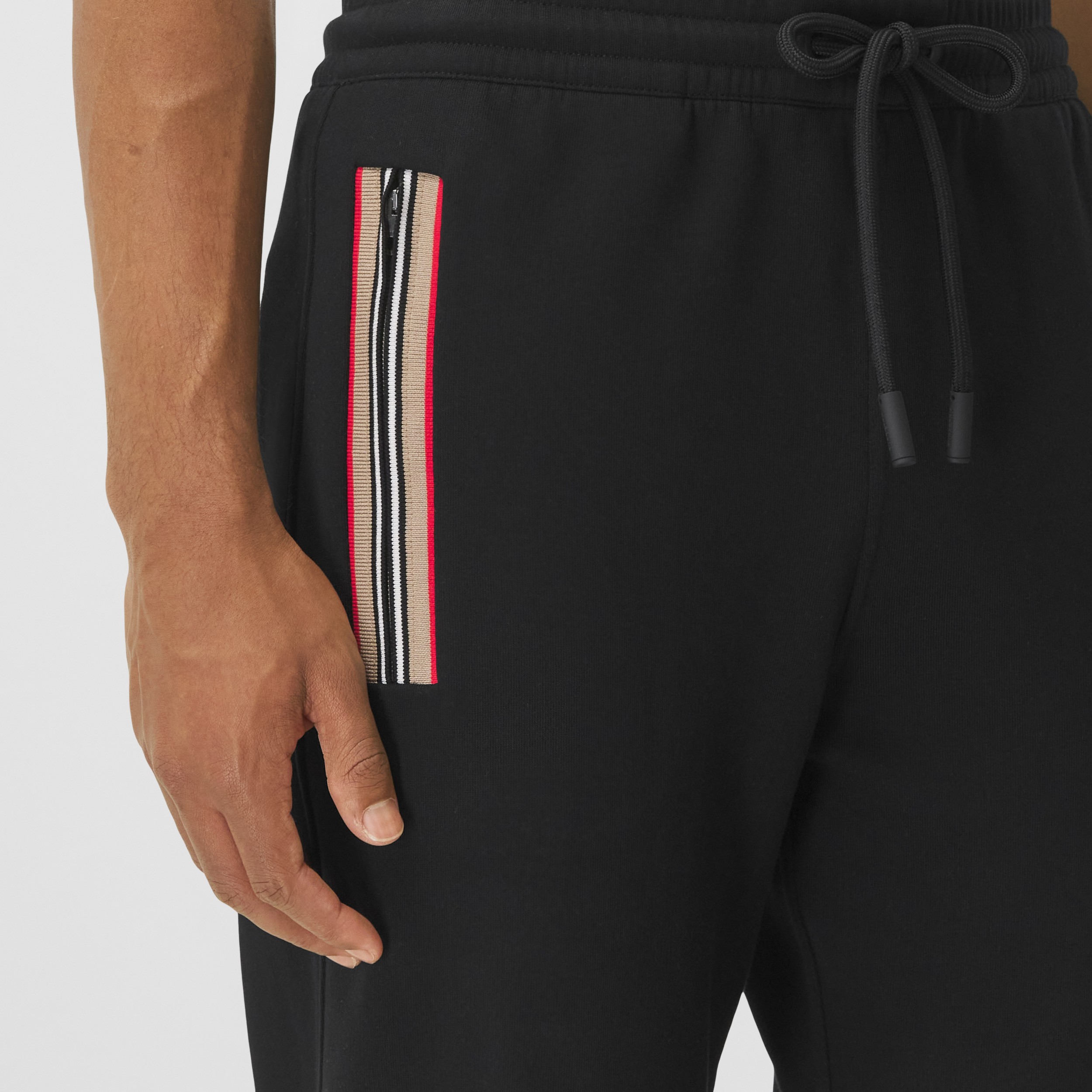 Icon Stripe Detail Cotton Jogging Pants in Black Men Burberry® Official