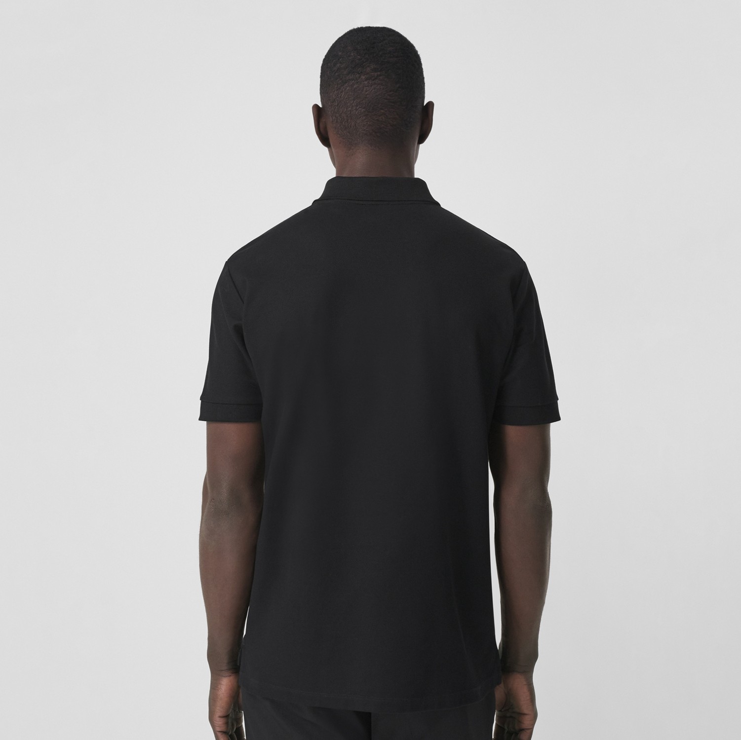 Monogram Motif Cotton Piqué Polo Shirt in Black - Men | Burberry® Official