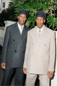 Shot of Chuka and Dubem Okonkwo wearing Burberry Tailoring Pinstripe Suits