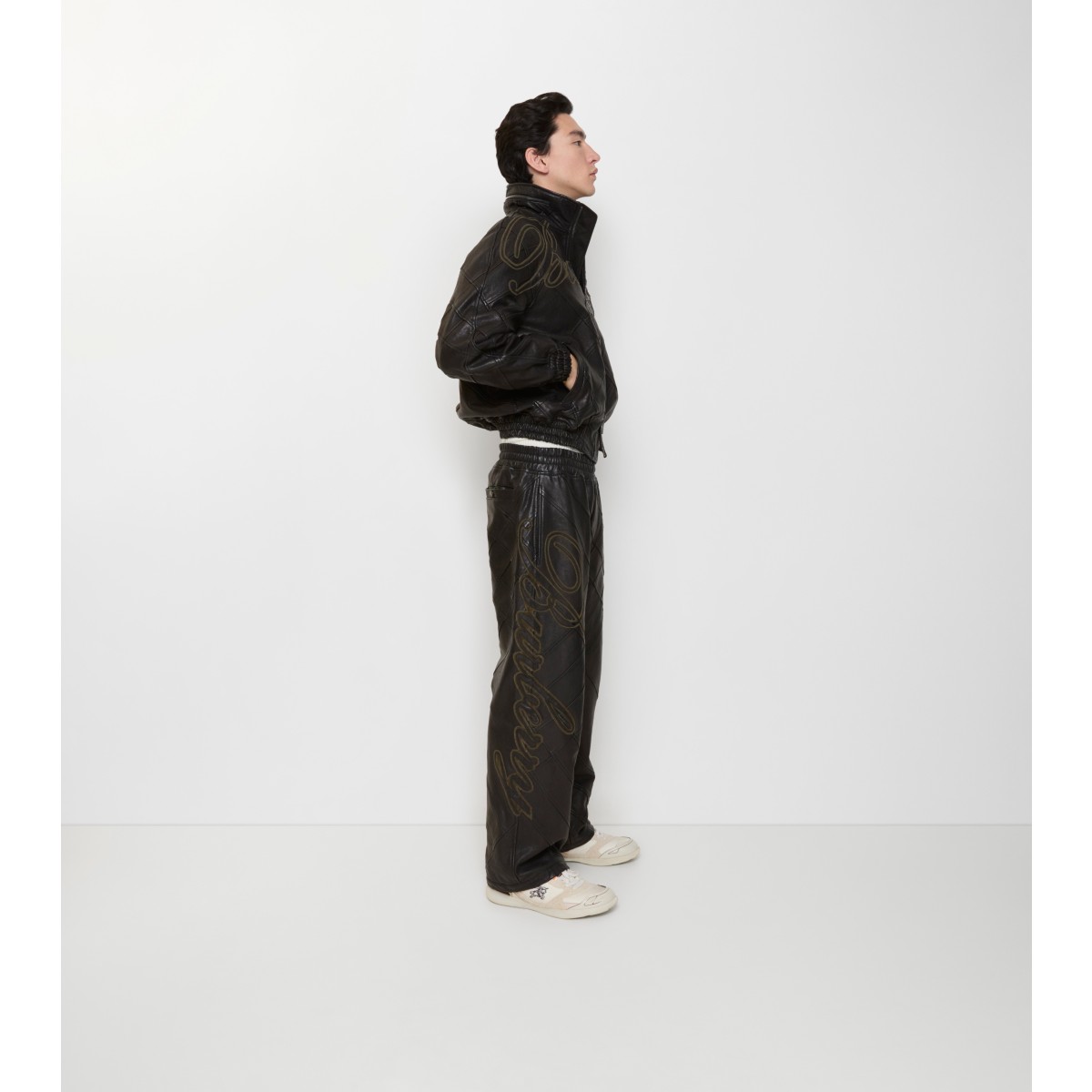 Check Cursive Logo Leather Trousers