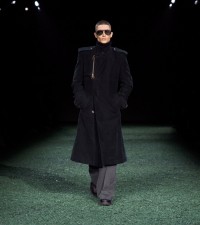 Model in Cotton blend moleskin trench coat in black
