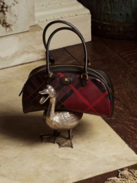 Shot of Medium Highlands Bowling Bag​ in colour Mahogany red
