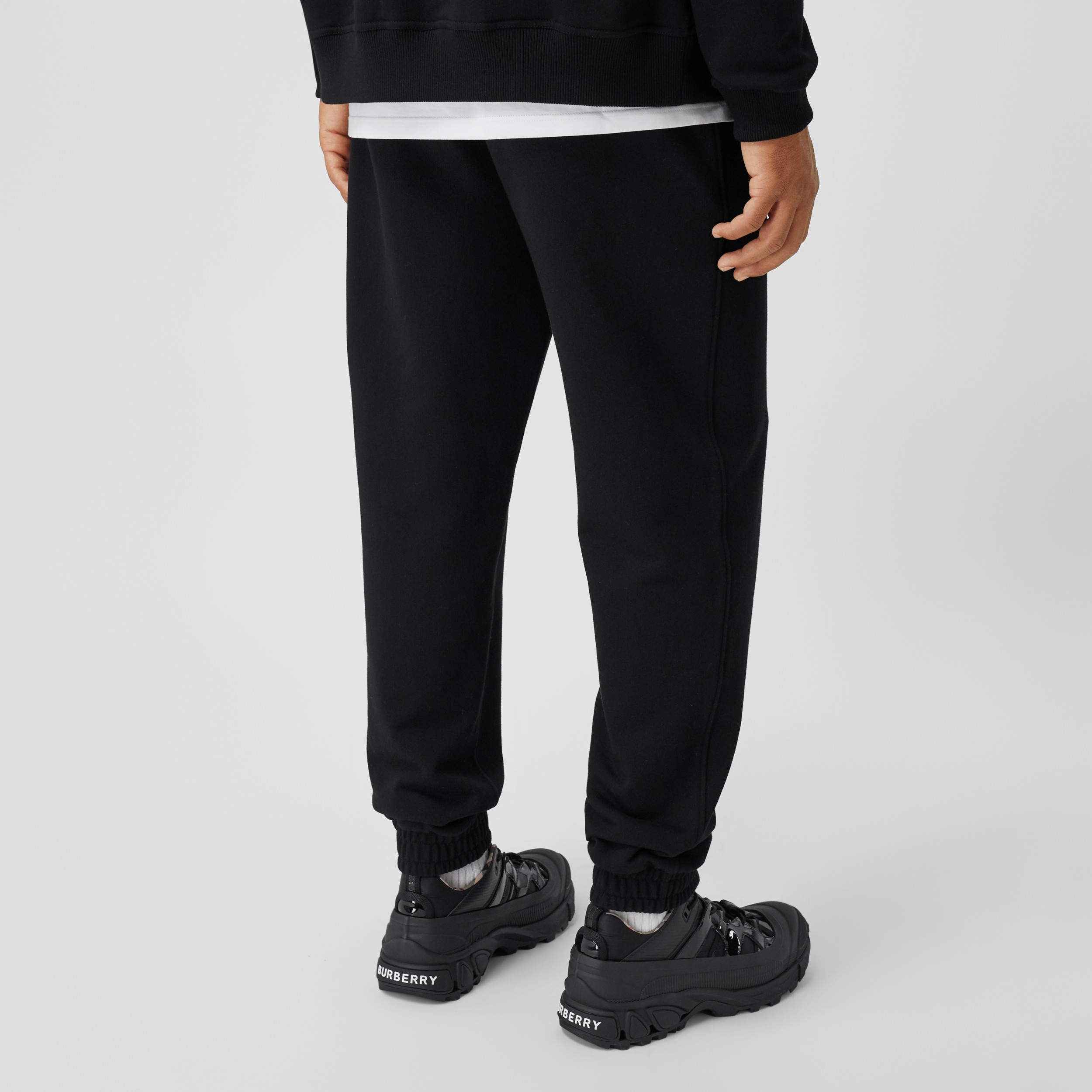 Icon Stripe Detail Cotton Jogging Pants in Black - Men | Burberry Canada