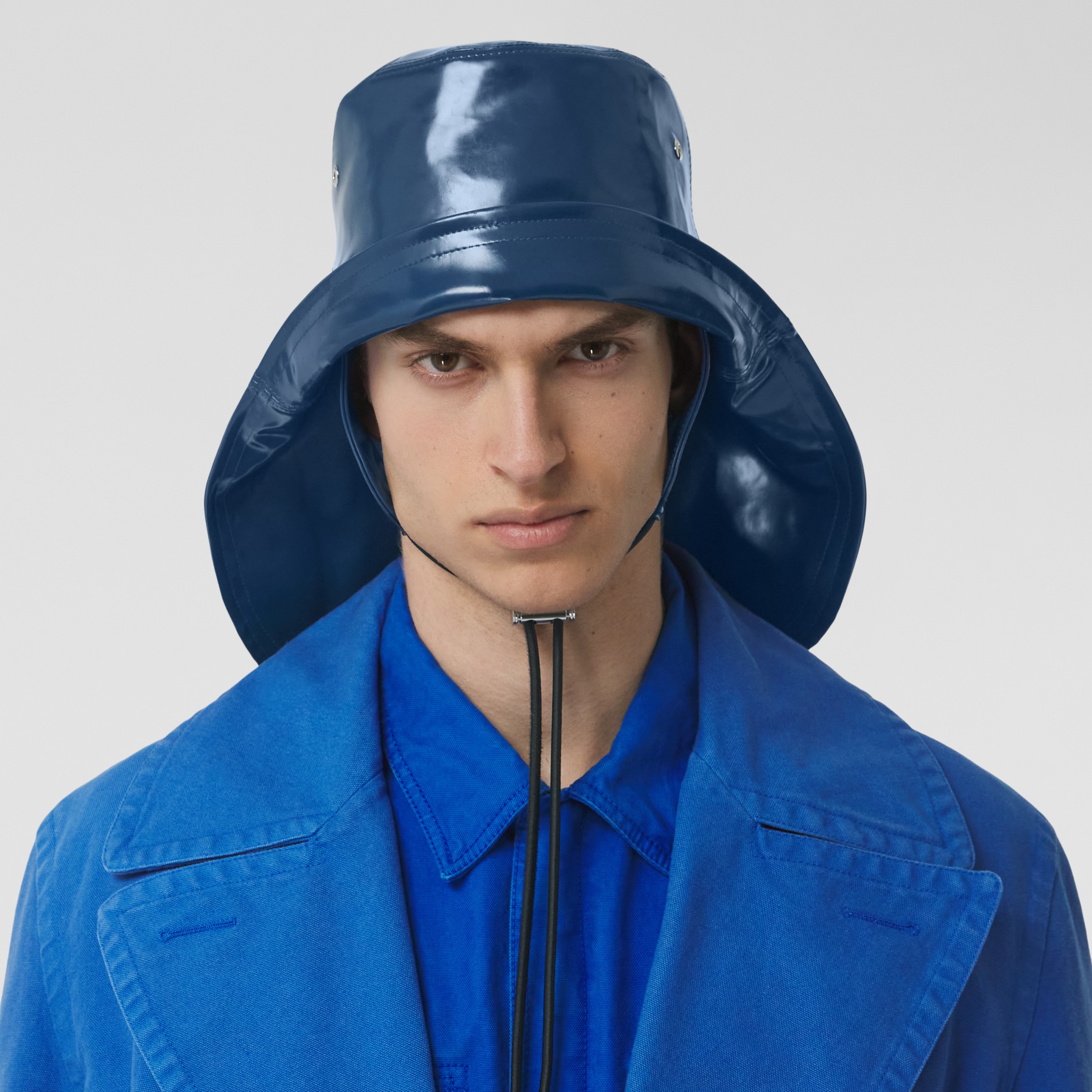 Logo Print Rubberised Cotton Fisherman Hat in Ink Blue Burberry