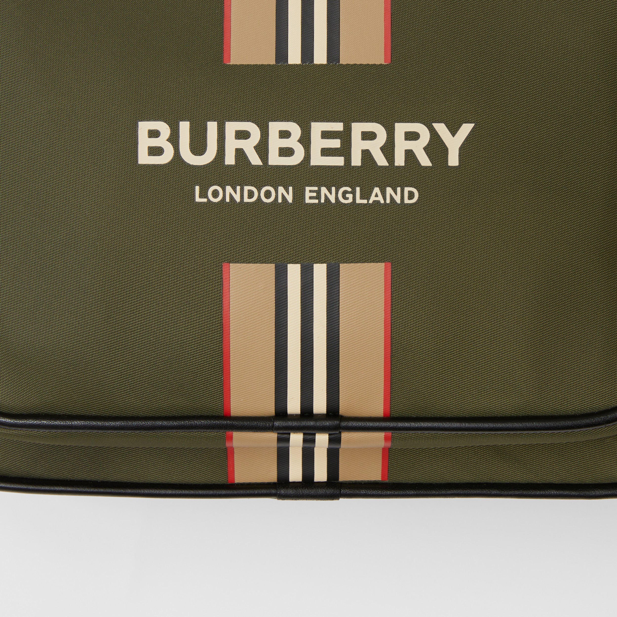 Logo and Icon Stripe Print ECONYL® Crossbody Bag in Dark Olive Green Men Burberry United States