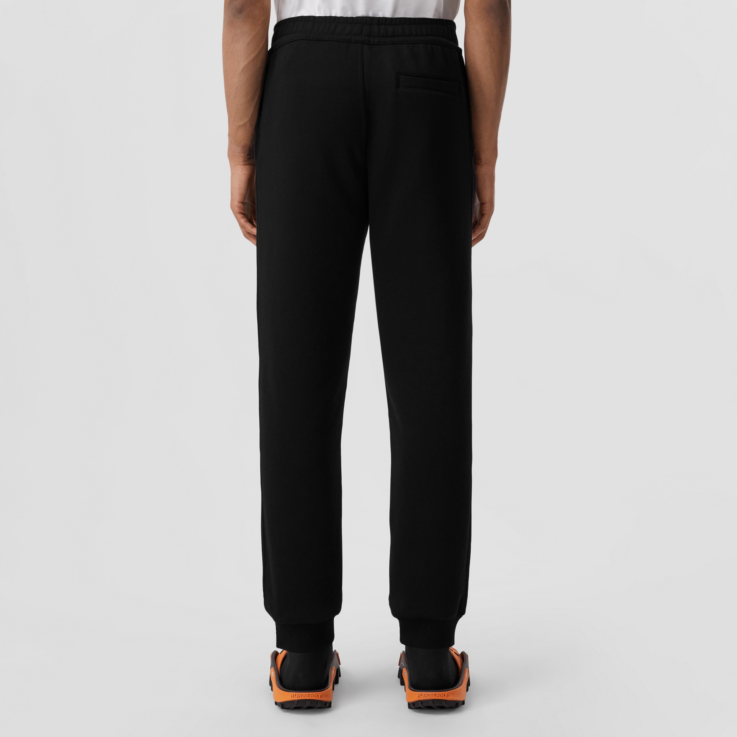 Logo Print Cotton Jogging Pants in Black - Men | Burberry® Official - 3