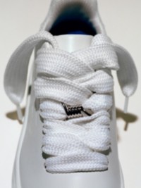 Sneakers blanches Burberry.