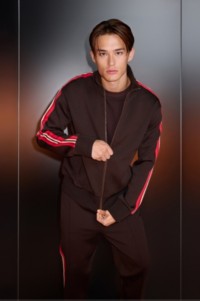 Model wearing Burberry Track Jacket with Red Stripes