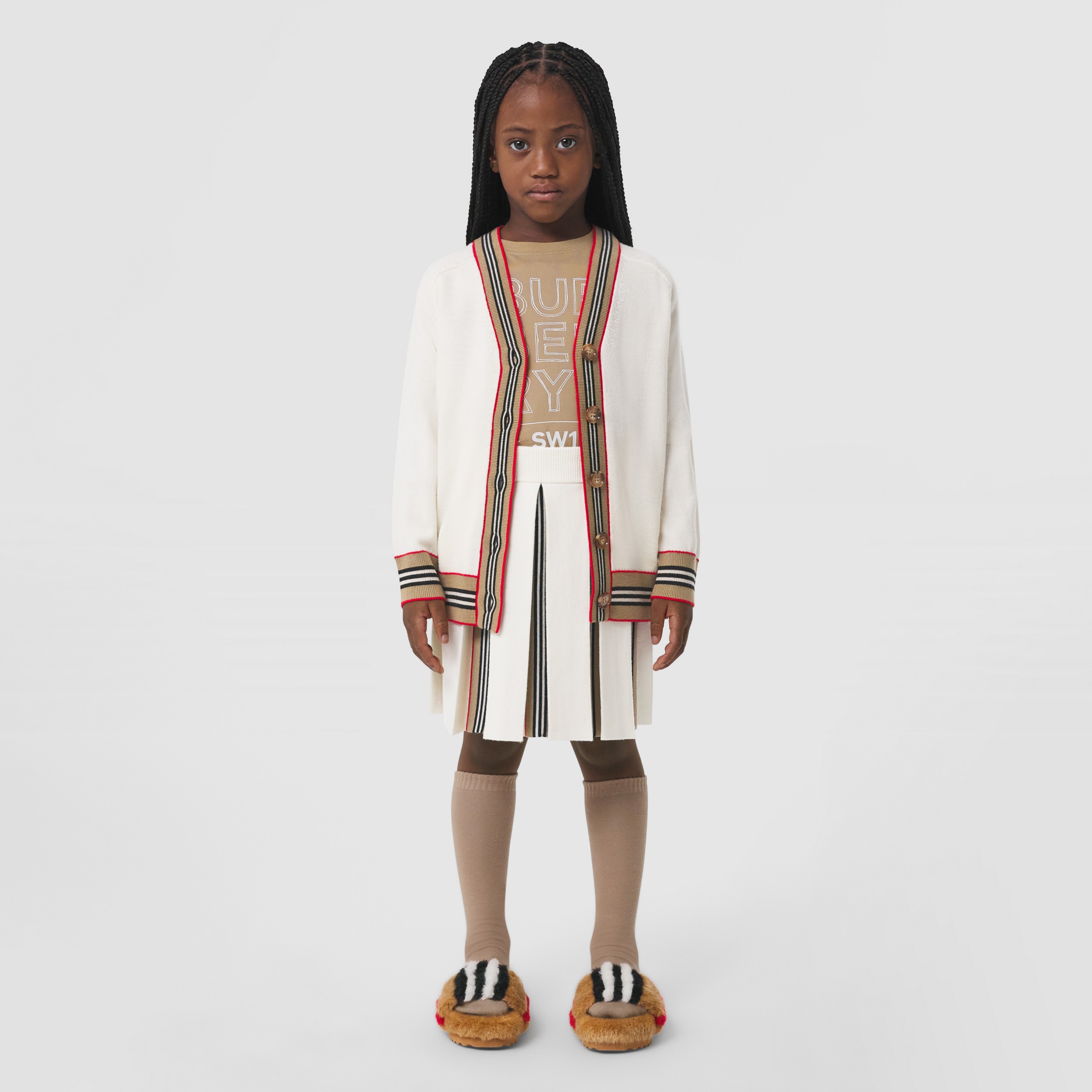 Falda de tablas en mezcla de lana con rayas Icon Stripe (Marfil) - Niños | Burberry® oficial - 3