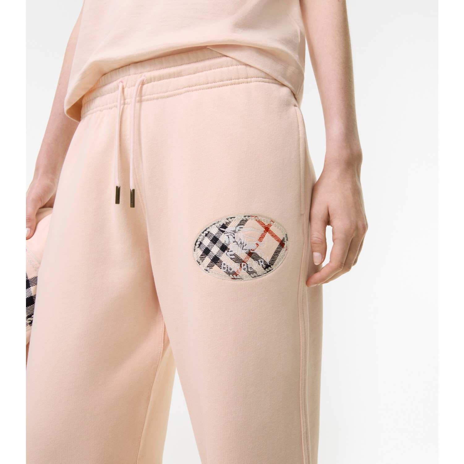Check Knight Stamp Cotton Track Pants in Compact pink - Women | Burberry® Official