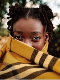 Rapper Little Simz, wearing Burberry Check Scarf