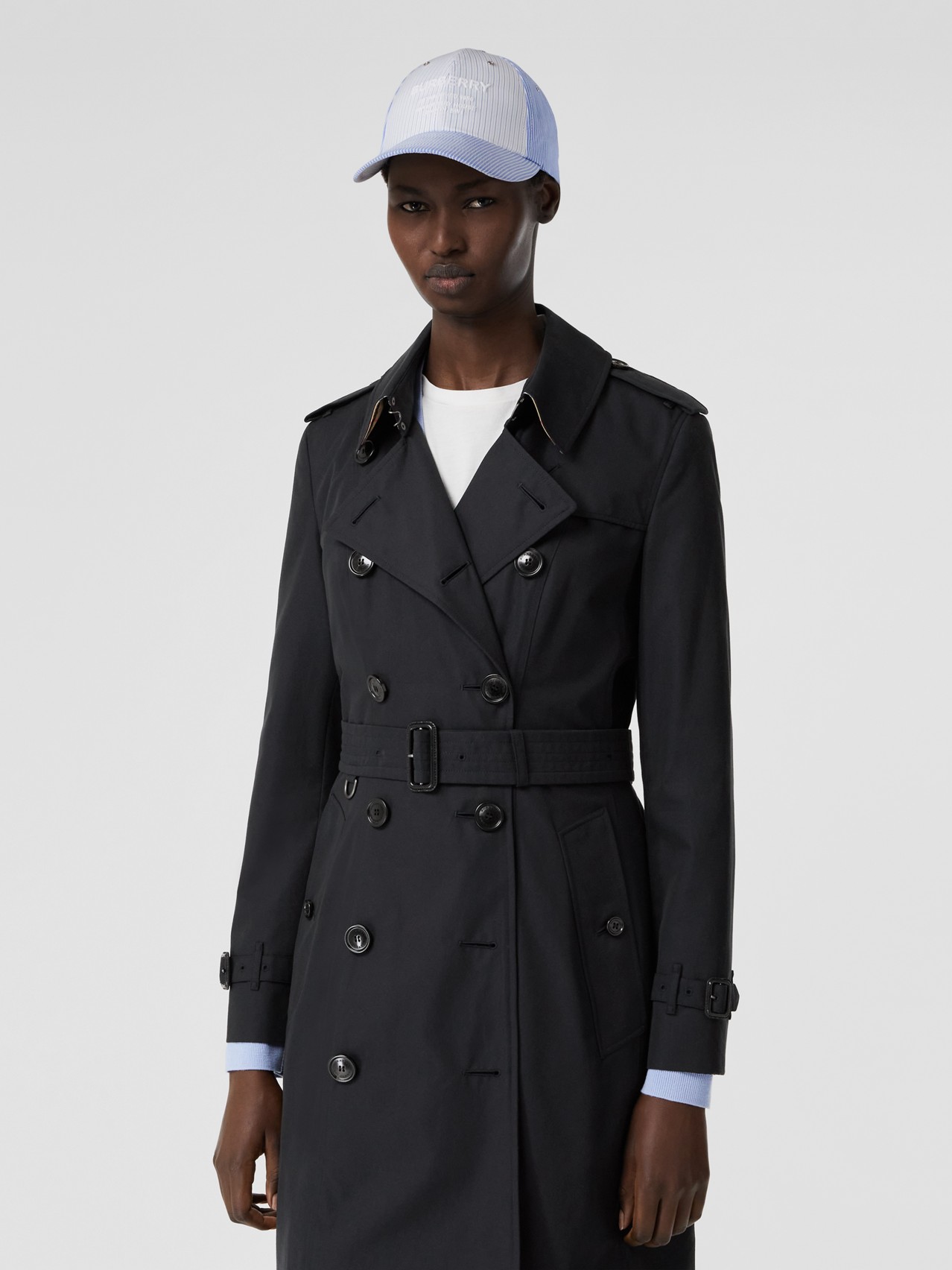 The Mid-length Chelsea Heritage Trench Coat by Burberry, available on burberry.com for $1650 Gigi Hadid Outerwear SIMILAR PRODUCT
