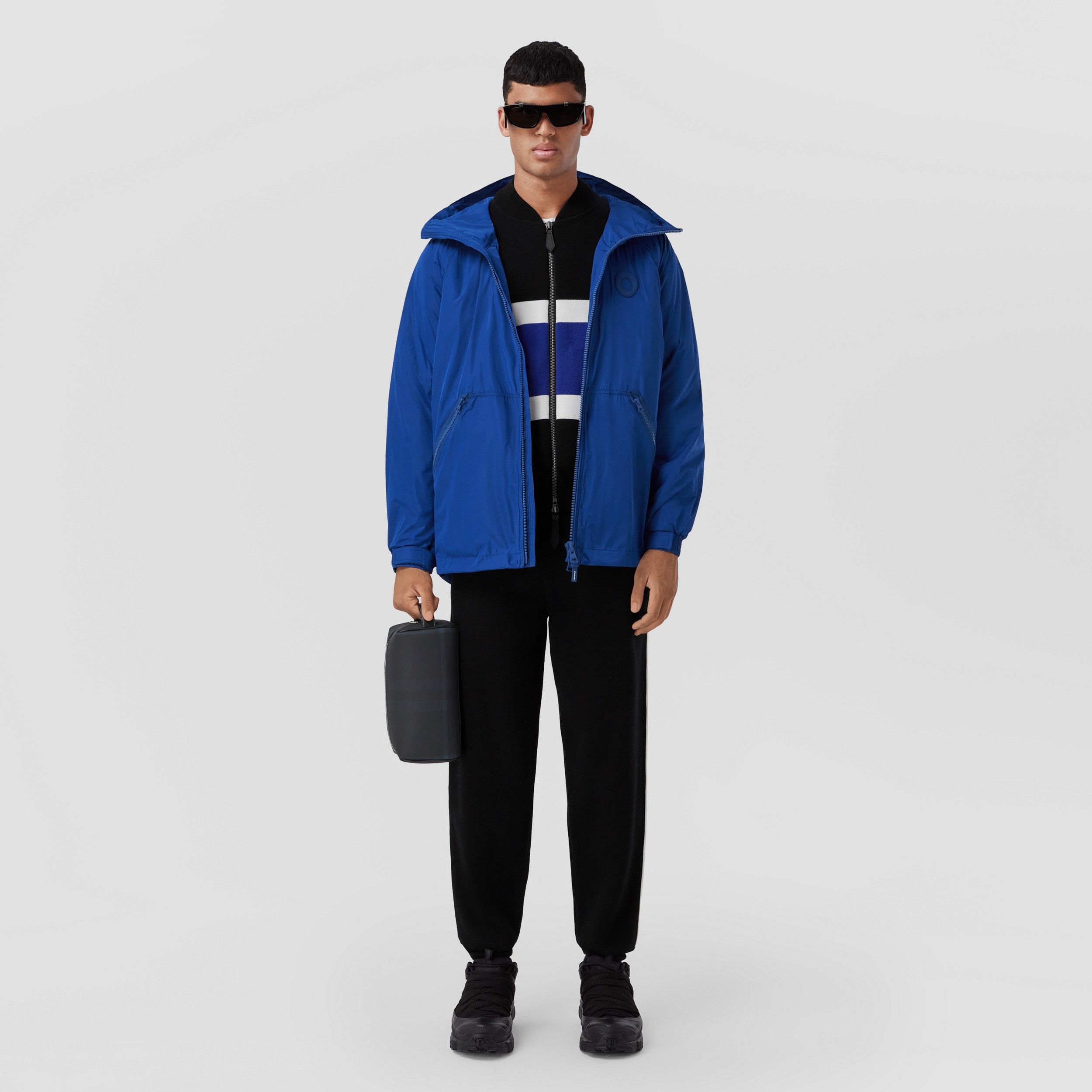 Logo Graphic Packaway Nylon Hooded Jacket in Deep Royal Blue - Men | Burberry® Official - 1