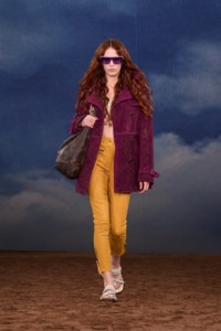 Burberry SS26 Show model Charlotte Moffat wearing a Paisley perforated suede trench coat and Leather Baez sandals