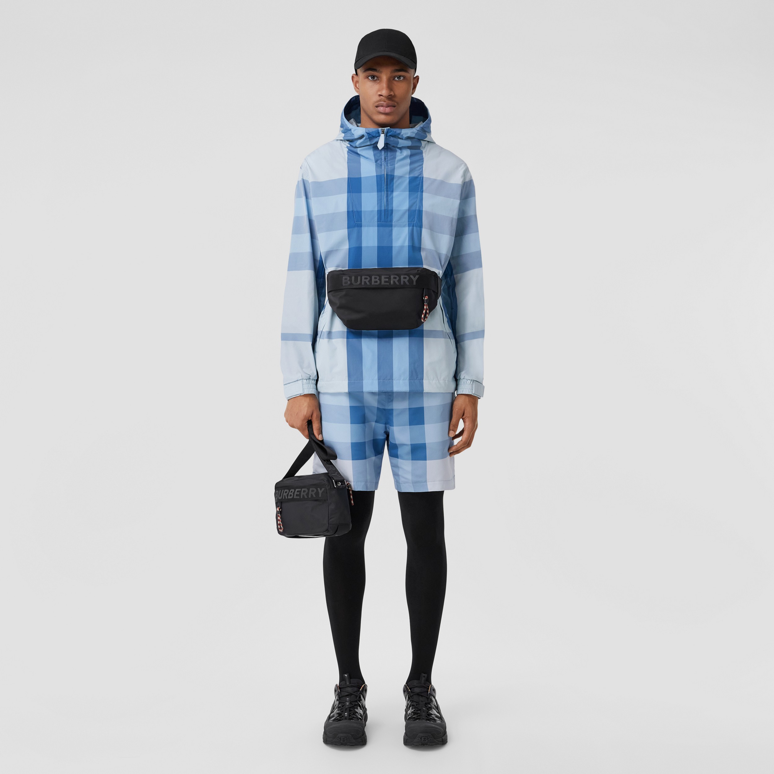 Packaway Check Nylon Hooded Jacket in Sky Blue - Men | Burberry® Official - 1