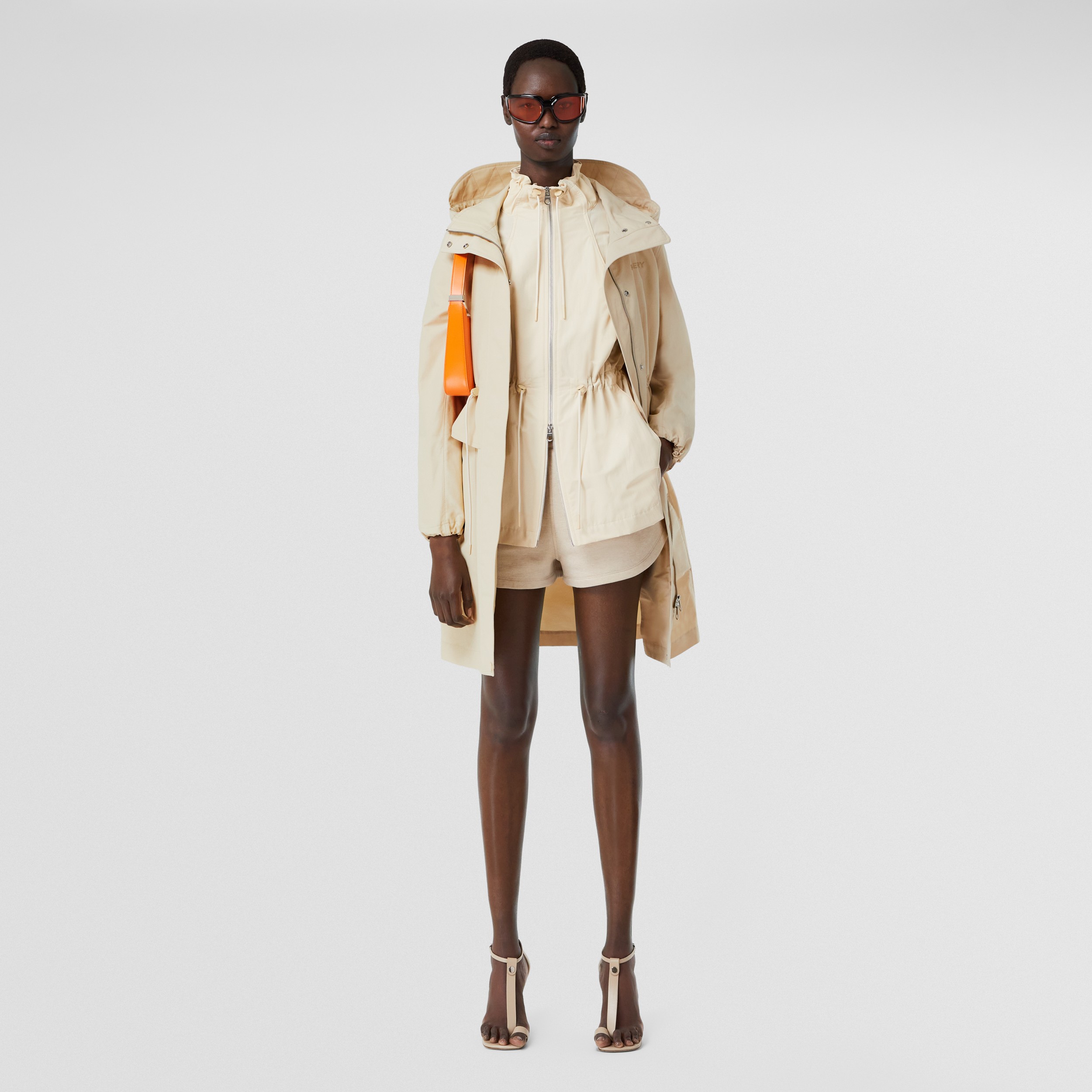 Logo Print Technical Cotton Hooded Parka in Pale Stone - Women | Burberry® Official - 1
