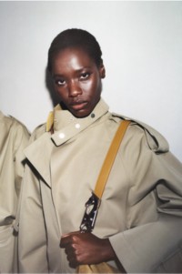 Burberry Model wearing Burberry Trench Coat.