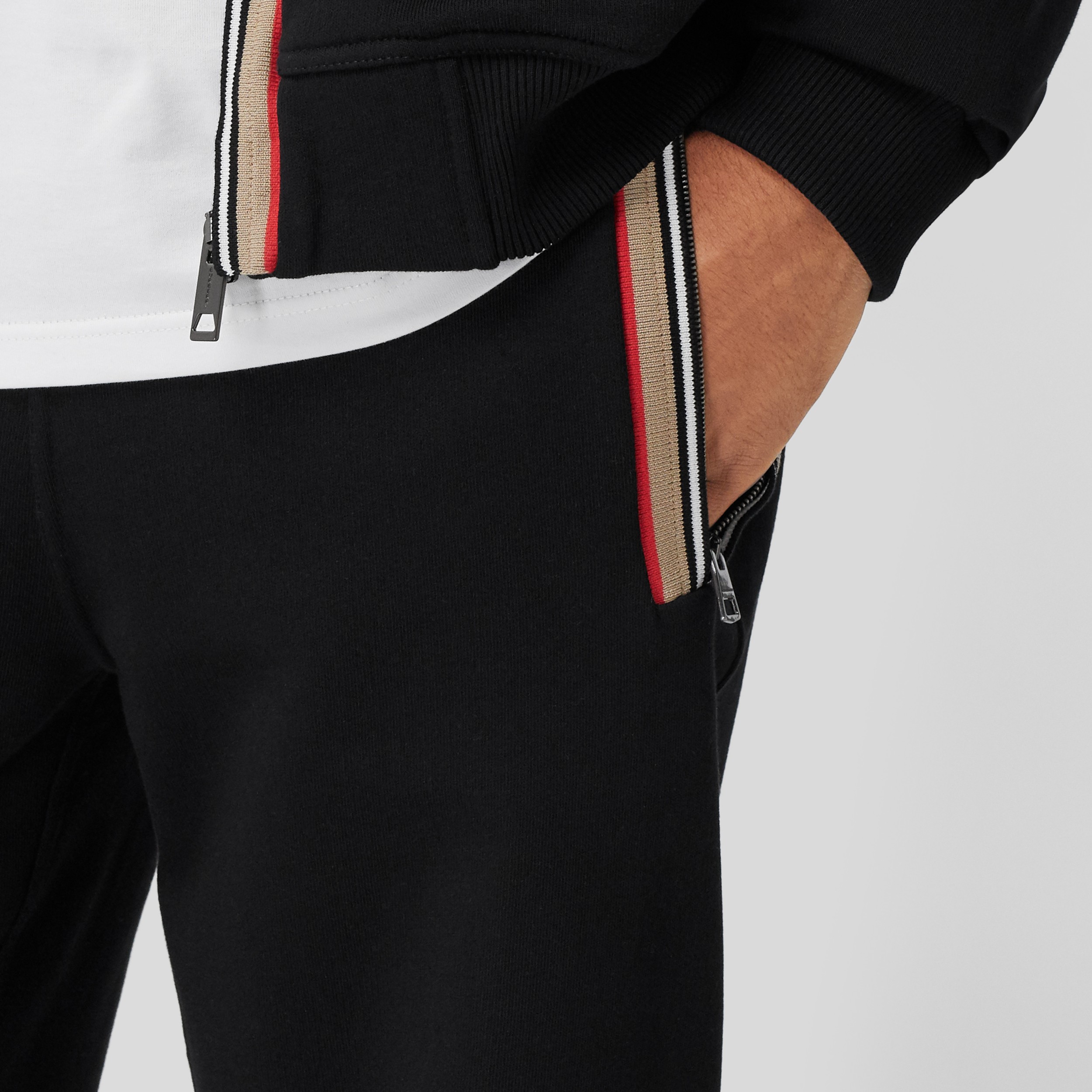 Icon Stripe Detail Cotton Jogging Pants in Black - Men | Burberry Canada