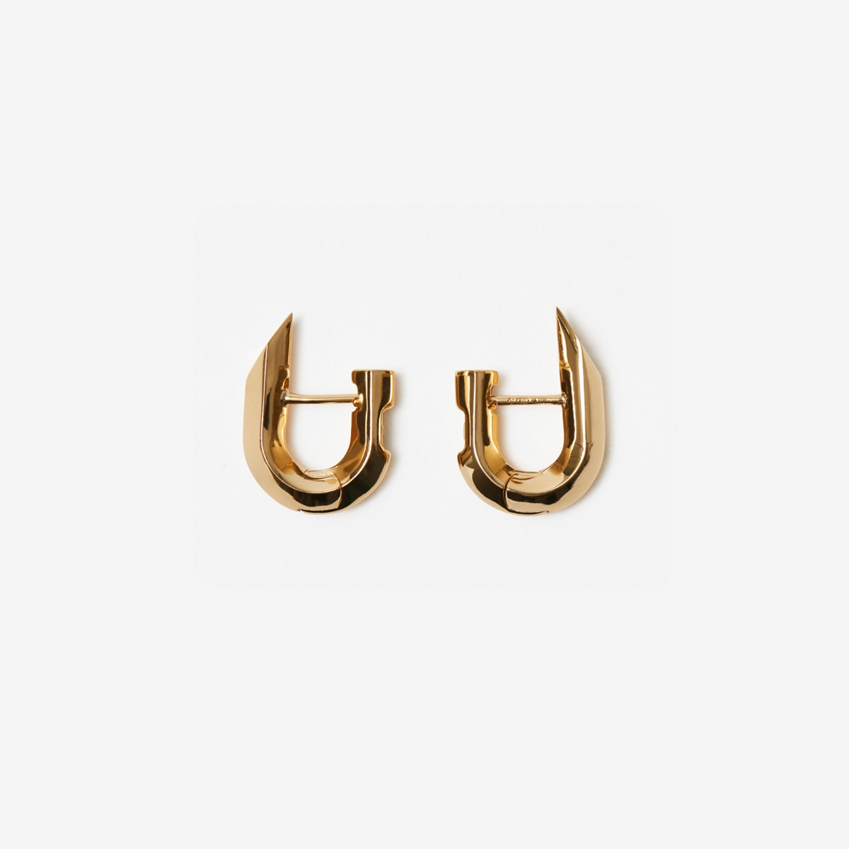 Shop Burberry Hollow Spike Earrings In Gold