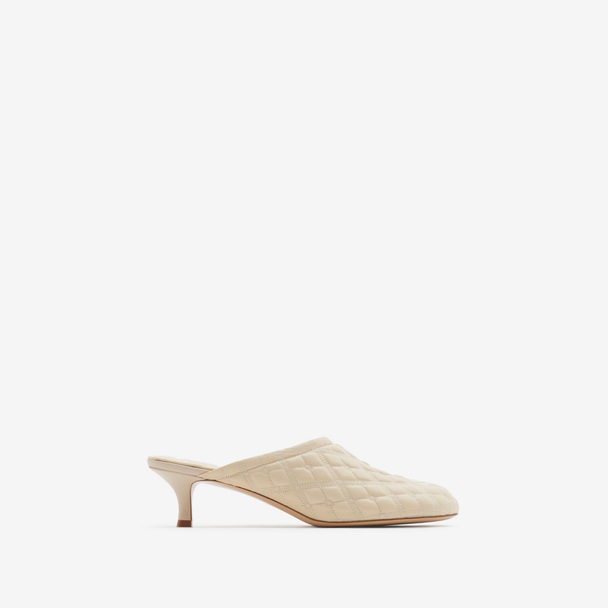 Shop Burberry Ekd Leather Baby Mules In Soap