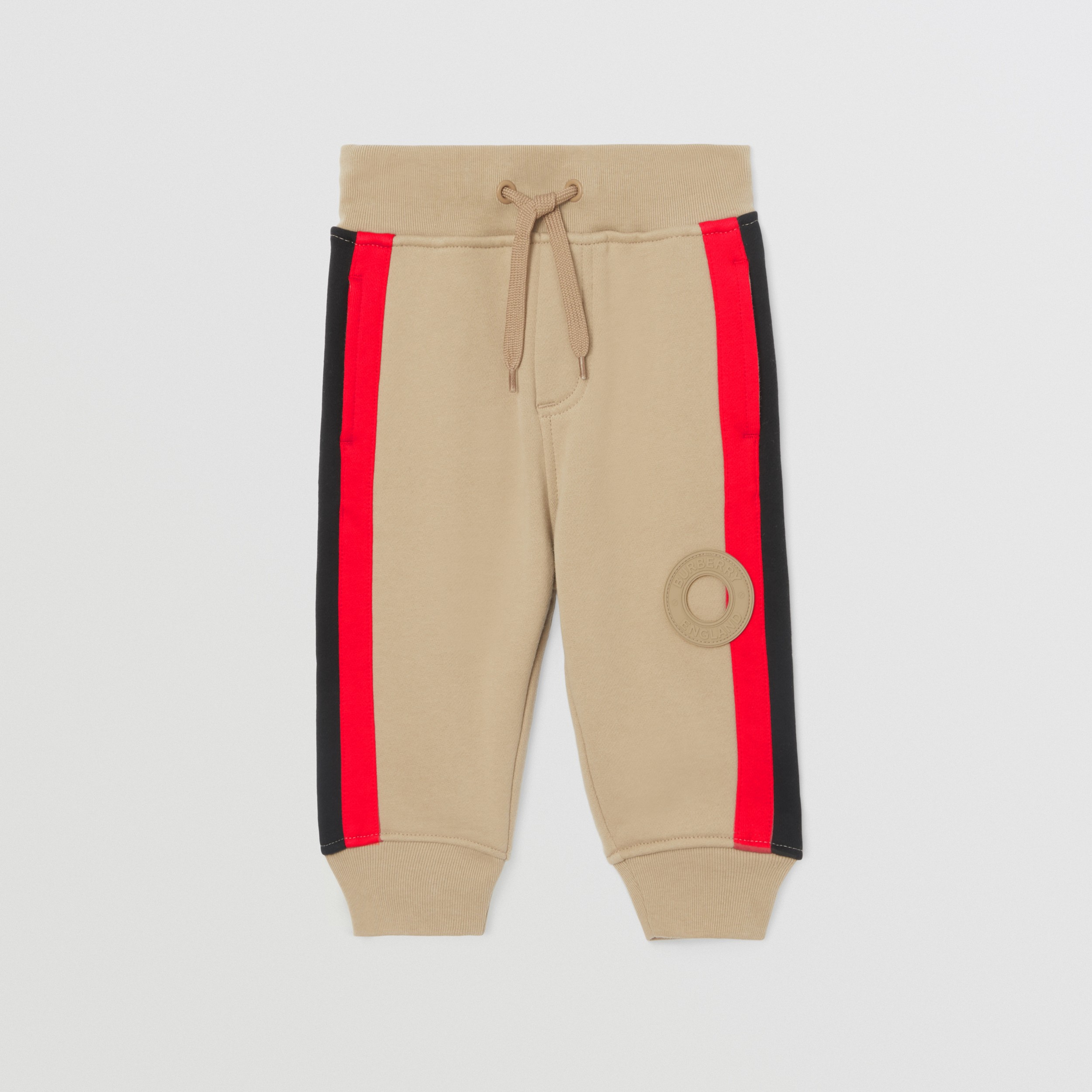 Pantalones de jogging en algodón con logotipo de estilo gráfico (Beige Vintage) - Niños | Burberry® oficial - 1