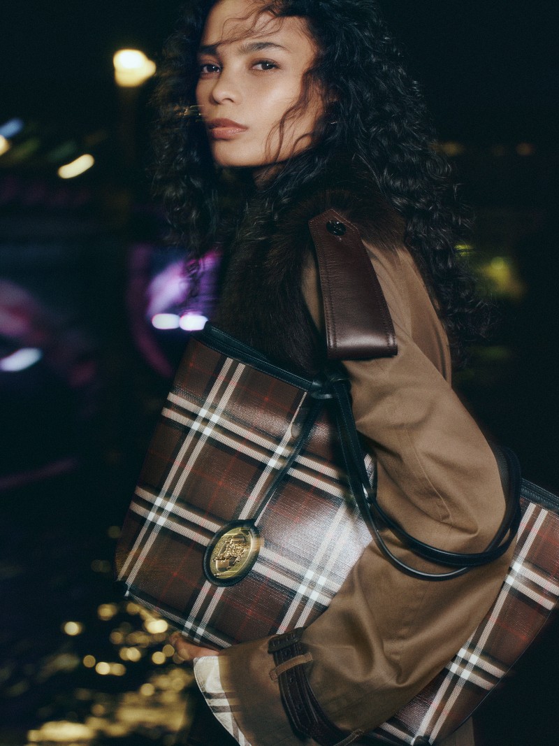 Shot of model wearing the Small Check Tote in colour Chocolate Brown