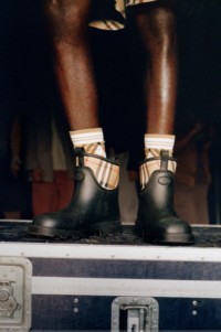 Model wearing Burberry Check Welly Boots