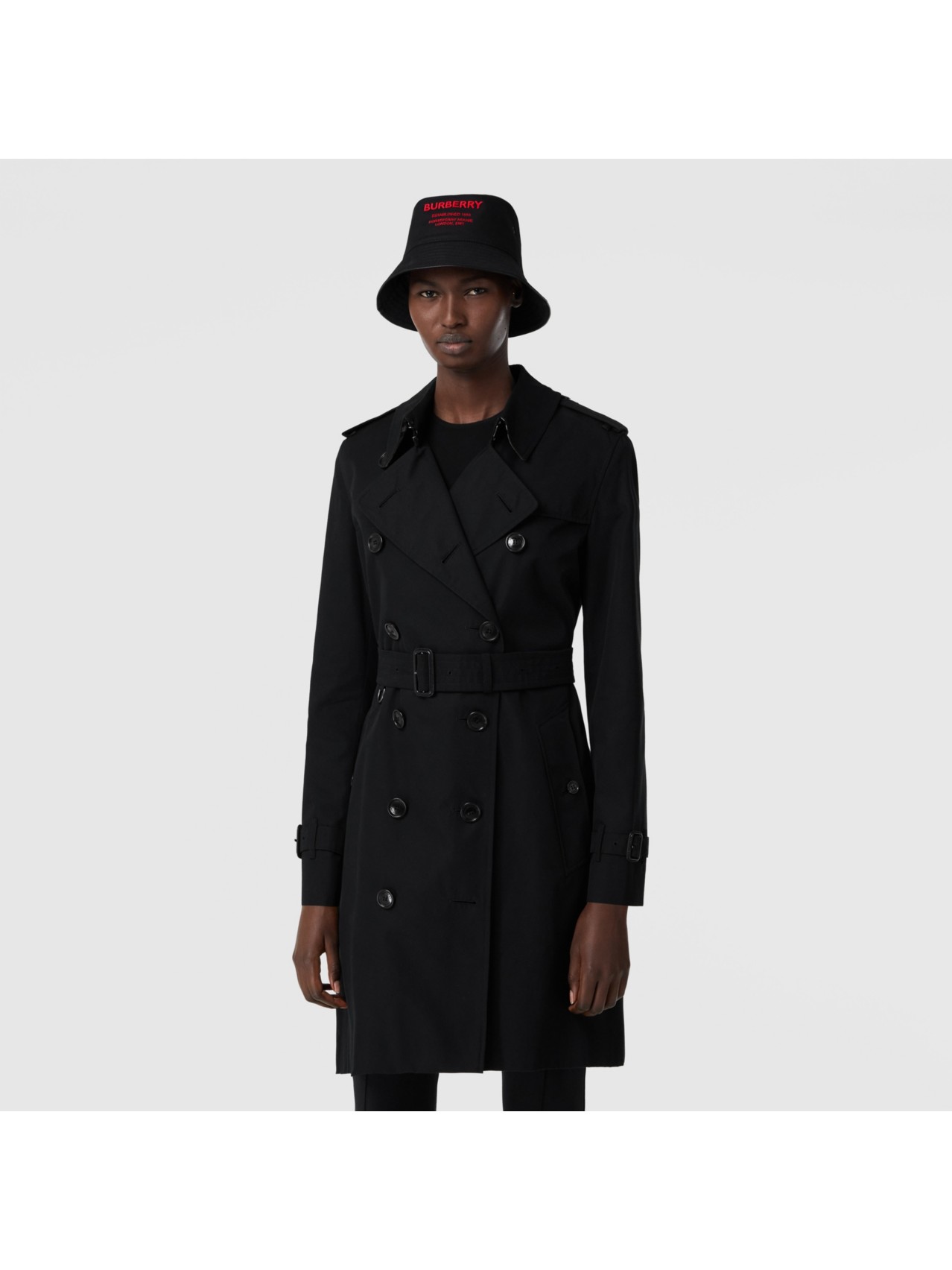 The Mid-length Kensington Heritage Trench Coat by Burberry, available on burberry.com for $1650 Gigi Hadid Outerwear SIMILAR PRODUCT