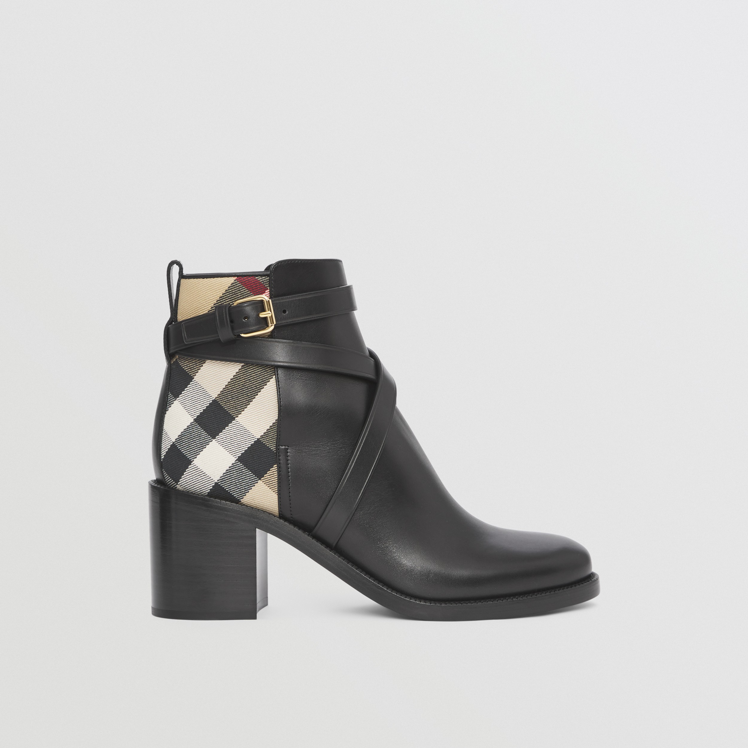 Ankle boots de couro com estampa House Check (Preto/bege Clássico) - Mulheres | Burberry® oficial - 1