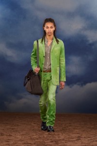 Burberry SS26 Show model Malik Derdak wearing a green Coated denim tailored jacket and jeans