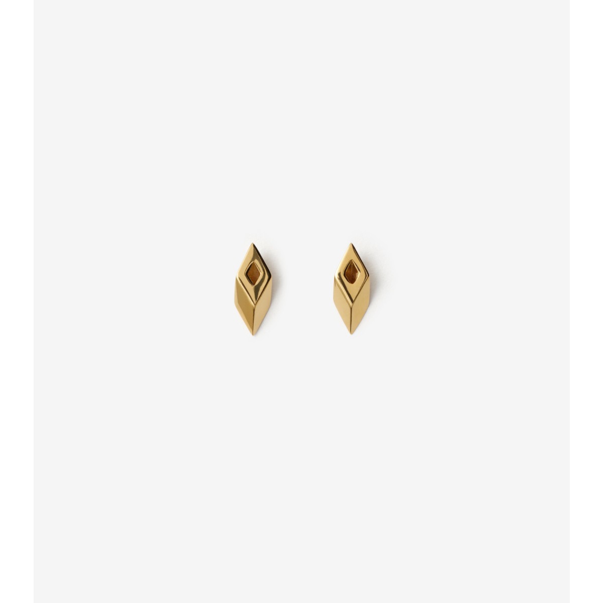 Shop Burberry Hollow Stud Earrings In Gold