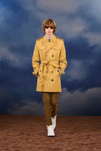 Burberry SS26 Show model Artie Aylott wearing a yellow Leather trench coat and Wool mohair tailored trousers