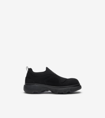 Black flat best sale slip on sneakers