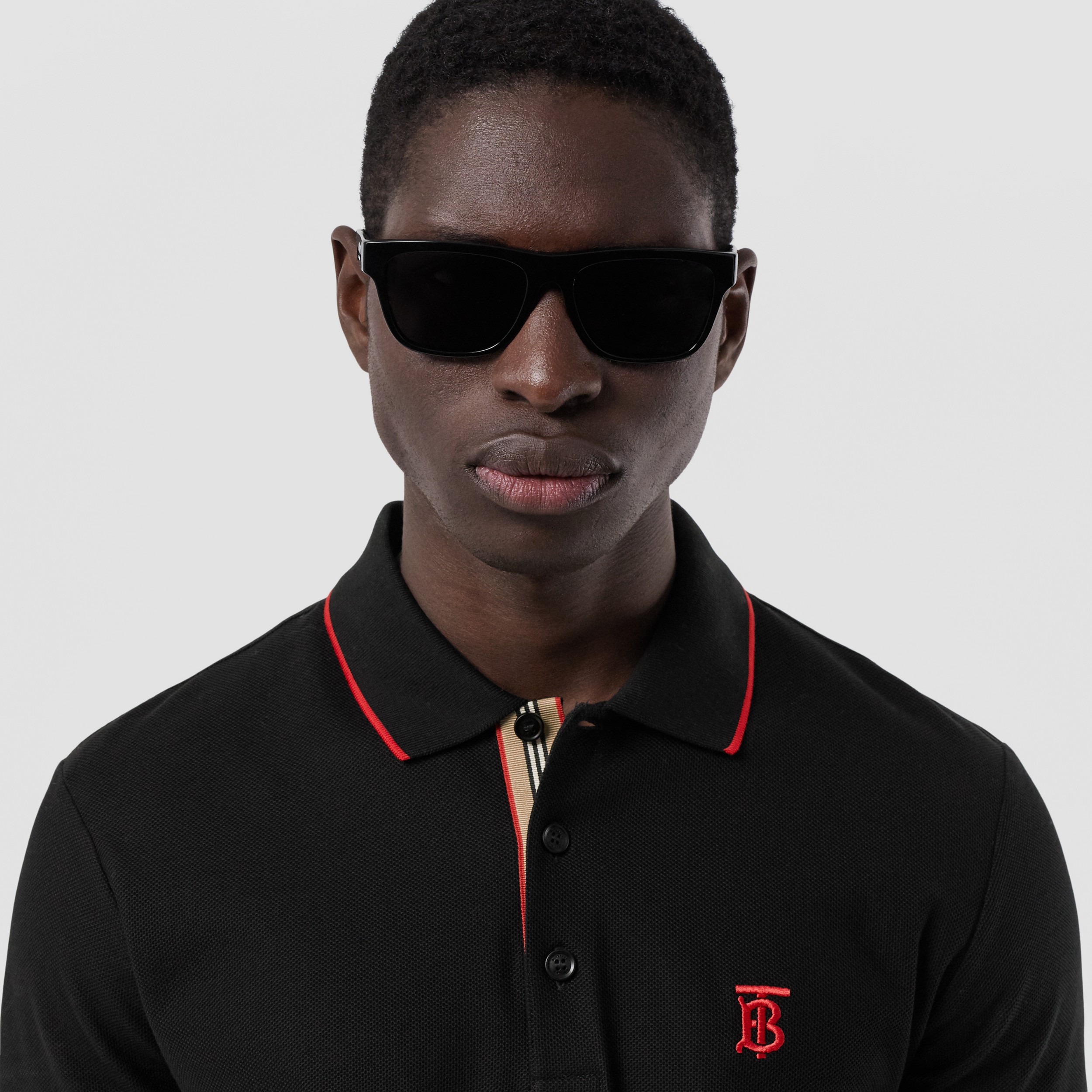 Icon Stripe Placket Cotton Piqué Polo Shirt in Black - Men | Burberry ...