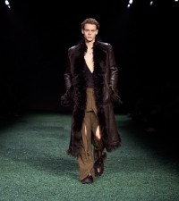 Model in Shearling biker coat in dark brown