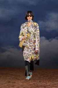 Burberry SS26 Show model Qisi Feng wearing a Tarot card print silk trench coat and a Check perforated suede Tavistock Bag