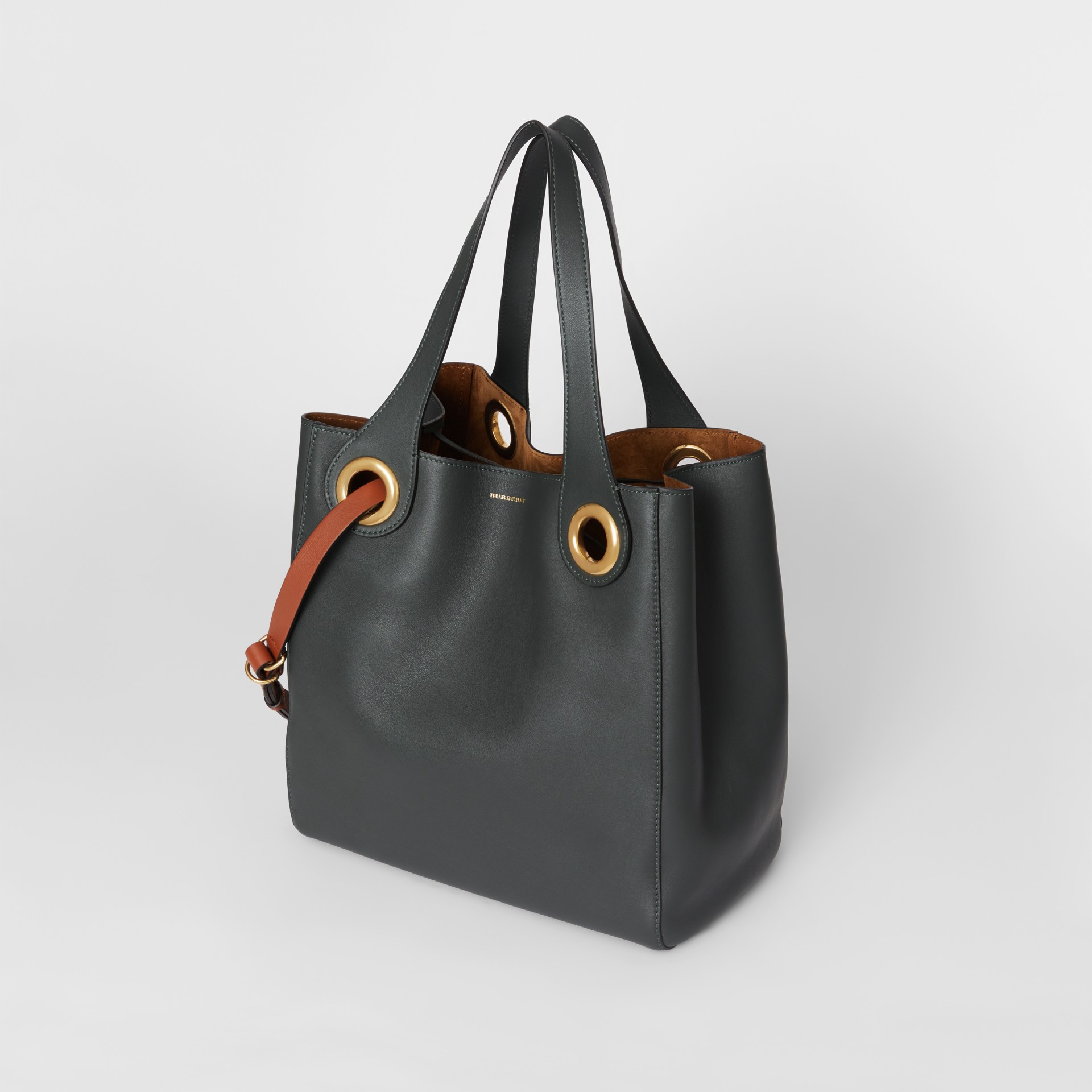 grommet detail strap bag