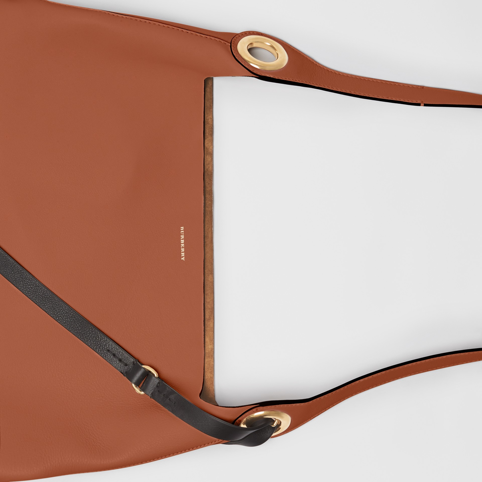 grommet detail strap bag