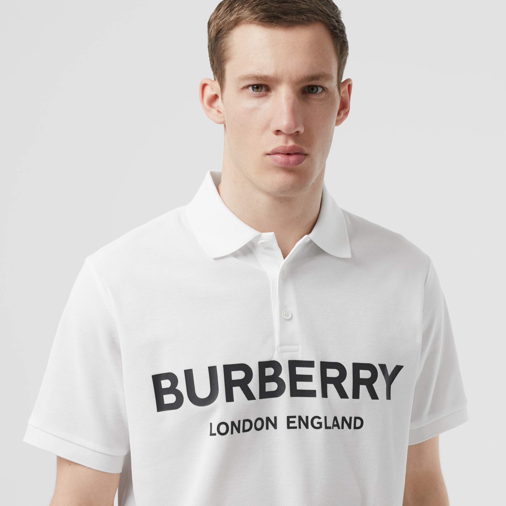 Logo Print Cotton Piqué Polo Shirt in White - Men | Burberry United Kingdom