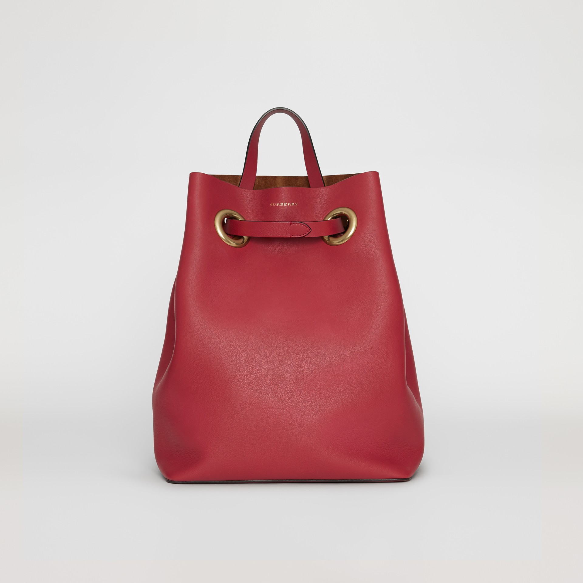 grommet detail strap bag