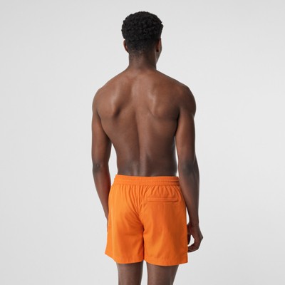 bright orange swim shorts