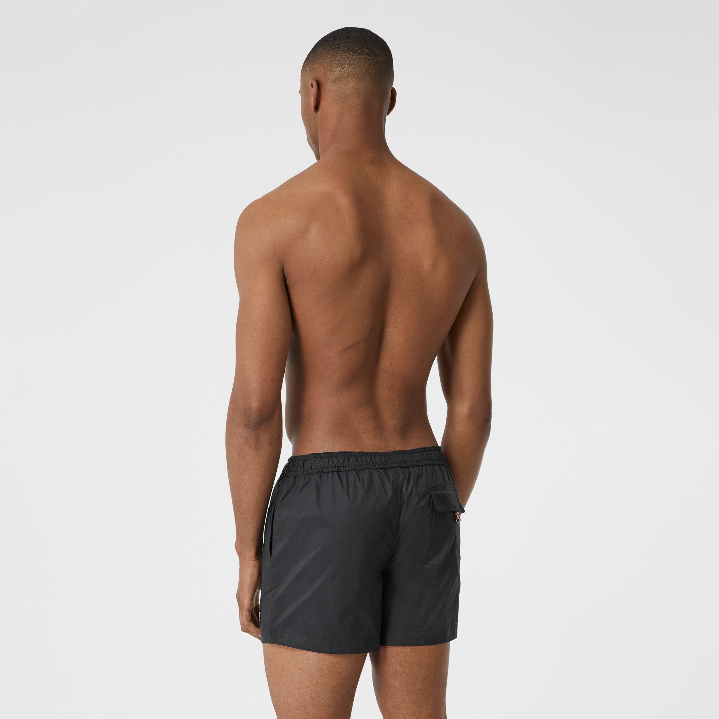 Logo Appliqué Drawcord Swim Shorts in Black - Men | Burberry United Kingdom