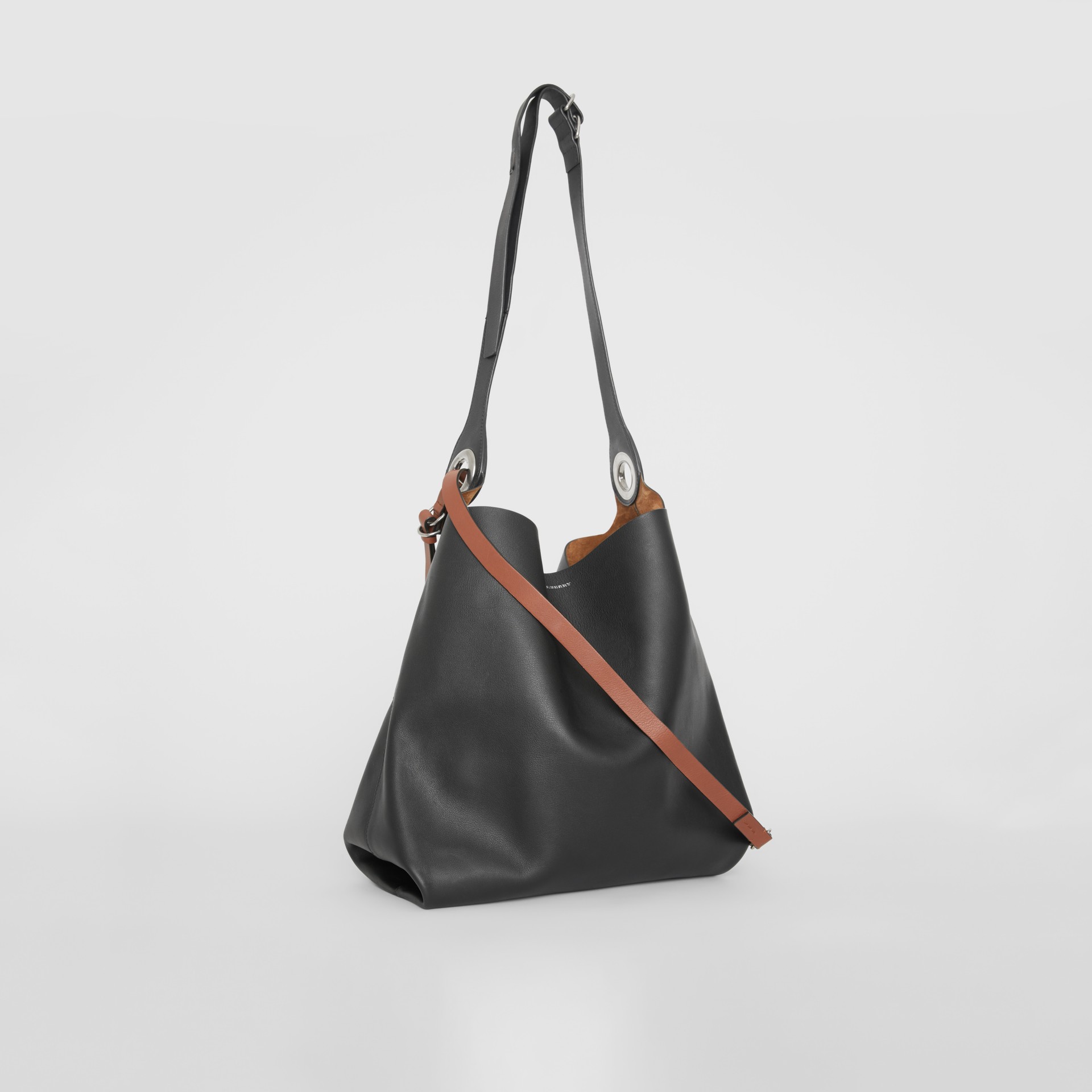 grommet detail strap bag